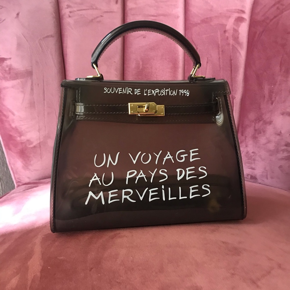 See through bag translates to Trip to Wonderland